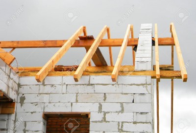 93475814-timber-roof-trusses-building-wooden-roof-frame-house-construction-.jpg